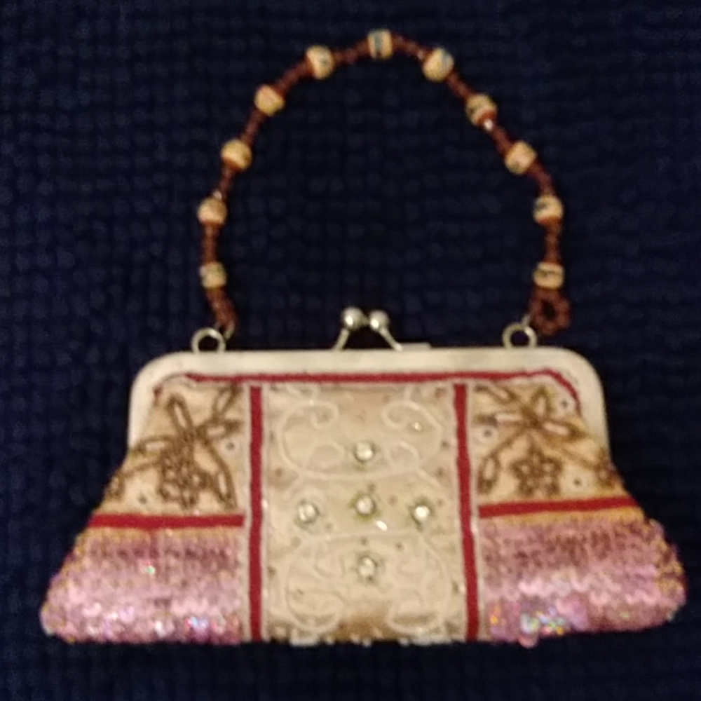 sequins bag with chain strap inside and handle